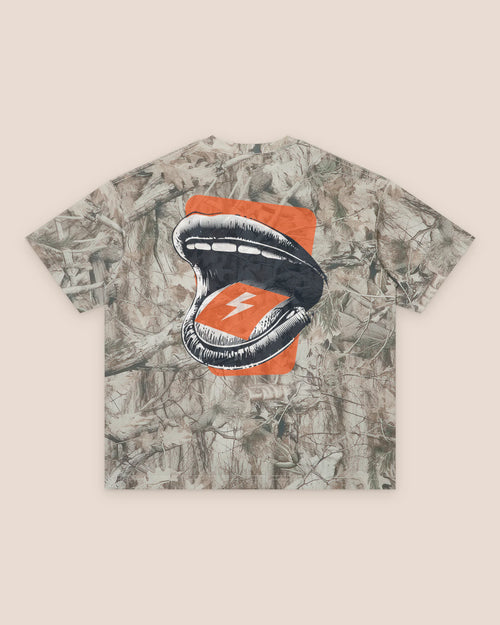 Canopy, back of the tee: an open mouth holding an orange strip marked with a lightning bolt, on an orange panel